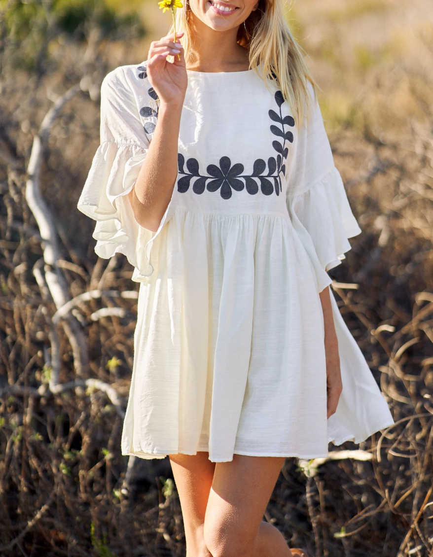 Babydoll Mini Dress with a 3/4 Flutter Sleeve and Front Embroidery Detail