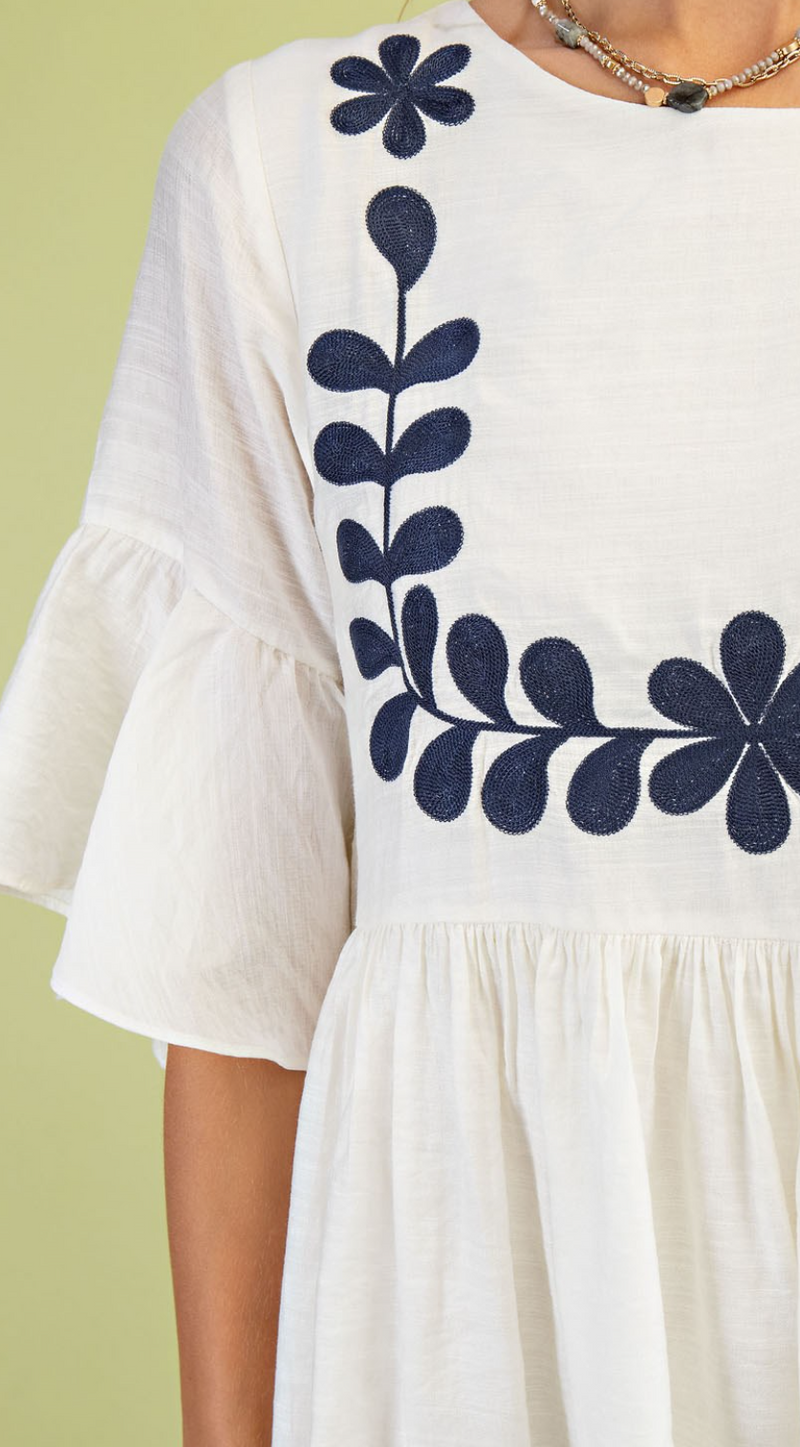 Babydoll Mini Dress with a 3/4 Flutter Sleeve and Front Embroidery Detail