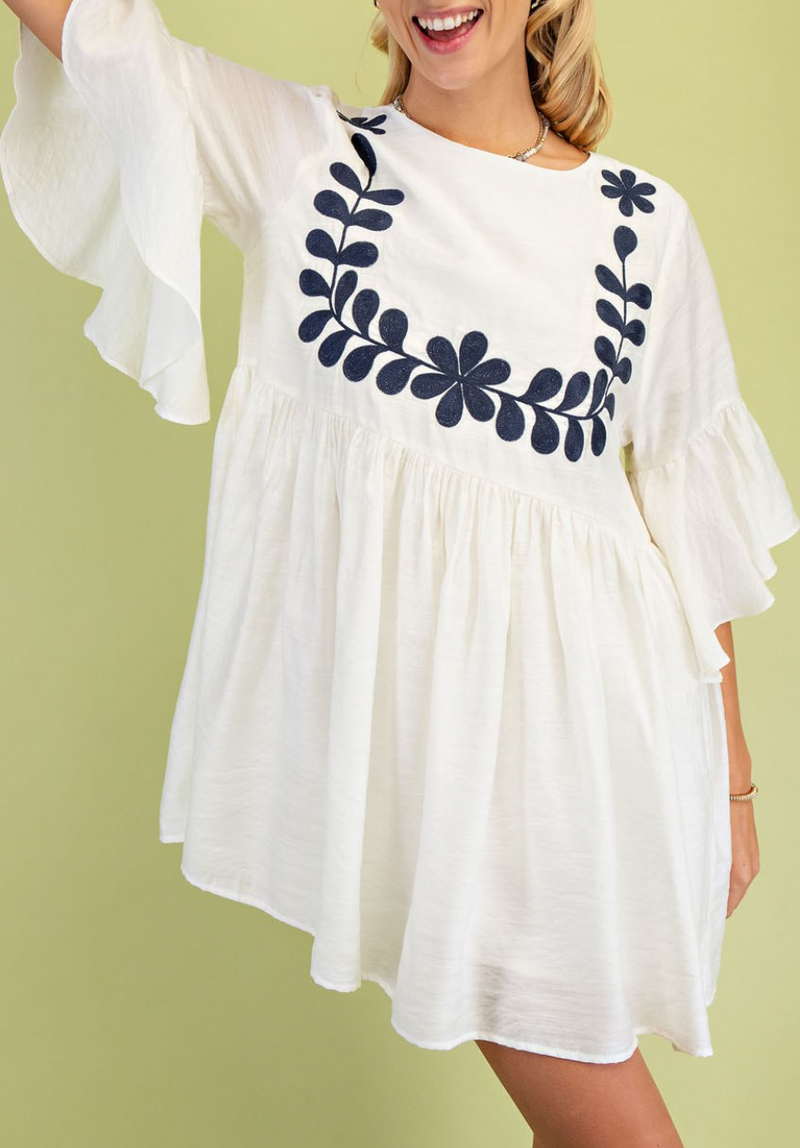 Babydoll Mini Dress with a 3/4 Flutter Sleeve and Front Embroidery Detail